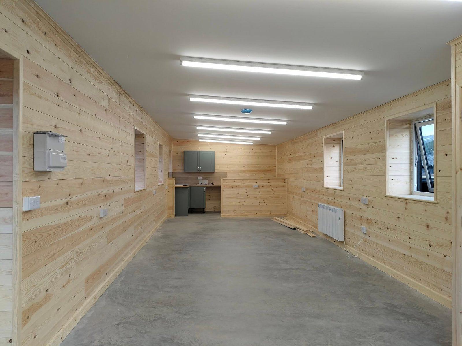 Finished timber-clad interior with a polished concrete floor